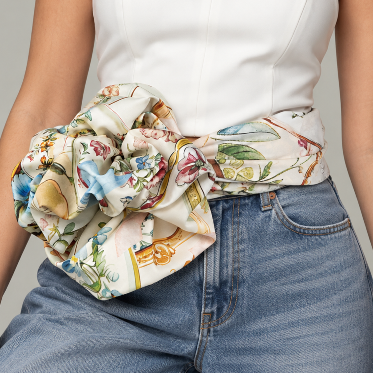 Romantic square fashion scarf featuring vintage teacup inspired artwork, colorful garden flowers and a powder blue border.