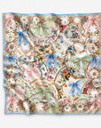 Oversized floral scarf featuring pink, blue and sage green bows layered over ornate porcelain inspired patterns.