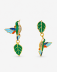 Cherish Hummingbird 18k Garden Dangles featuring colorful enamel hummingbirds and green leaf charms in an asymmetrical design.