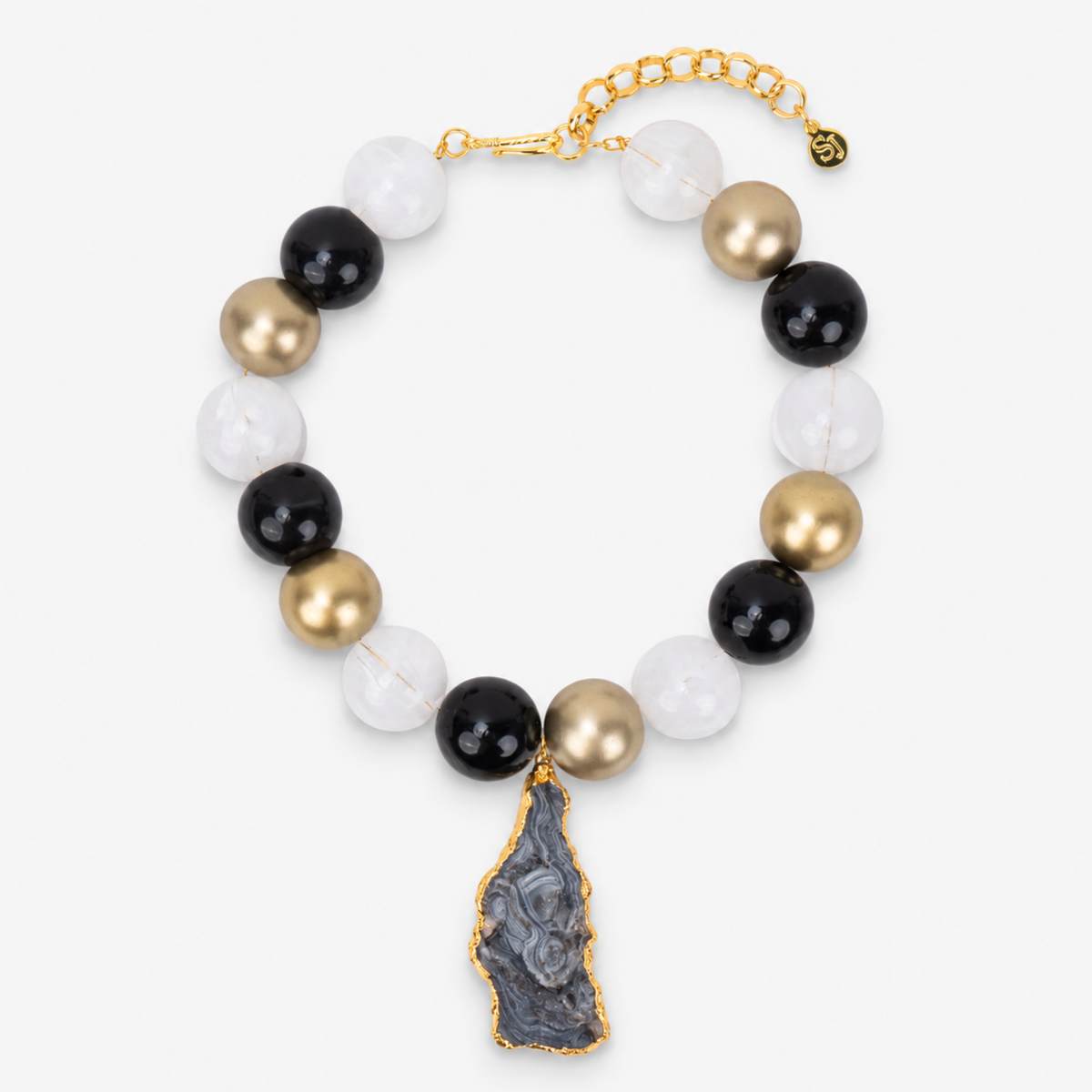 Chrysallis Agate Chunky Chain Black Gold featuring oversized black, clear, and brushed gold beads with a natural agate pendant.
