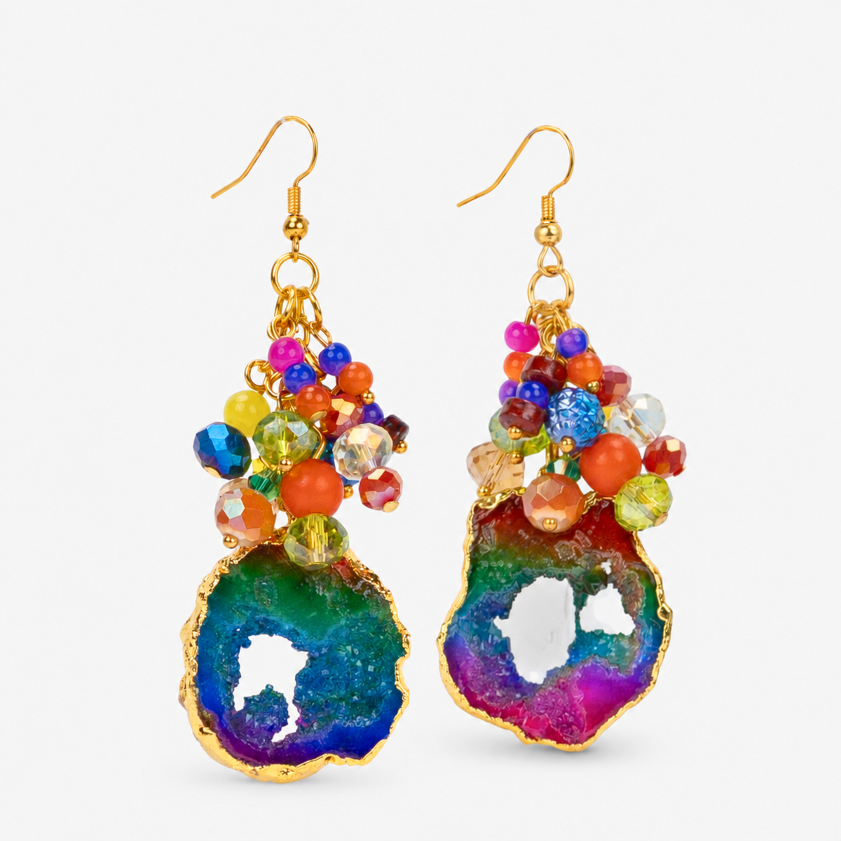 Multicolor statement earrings with raw agate drops, faceted rainbow beads, and gold details.