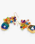 Multicolor statement earrings with raw agate drops, faceted rainbow beads, and gold details.