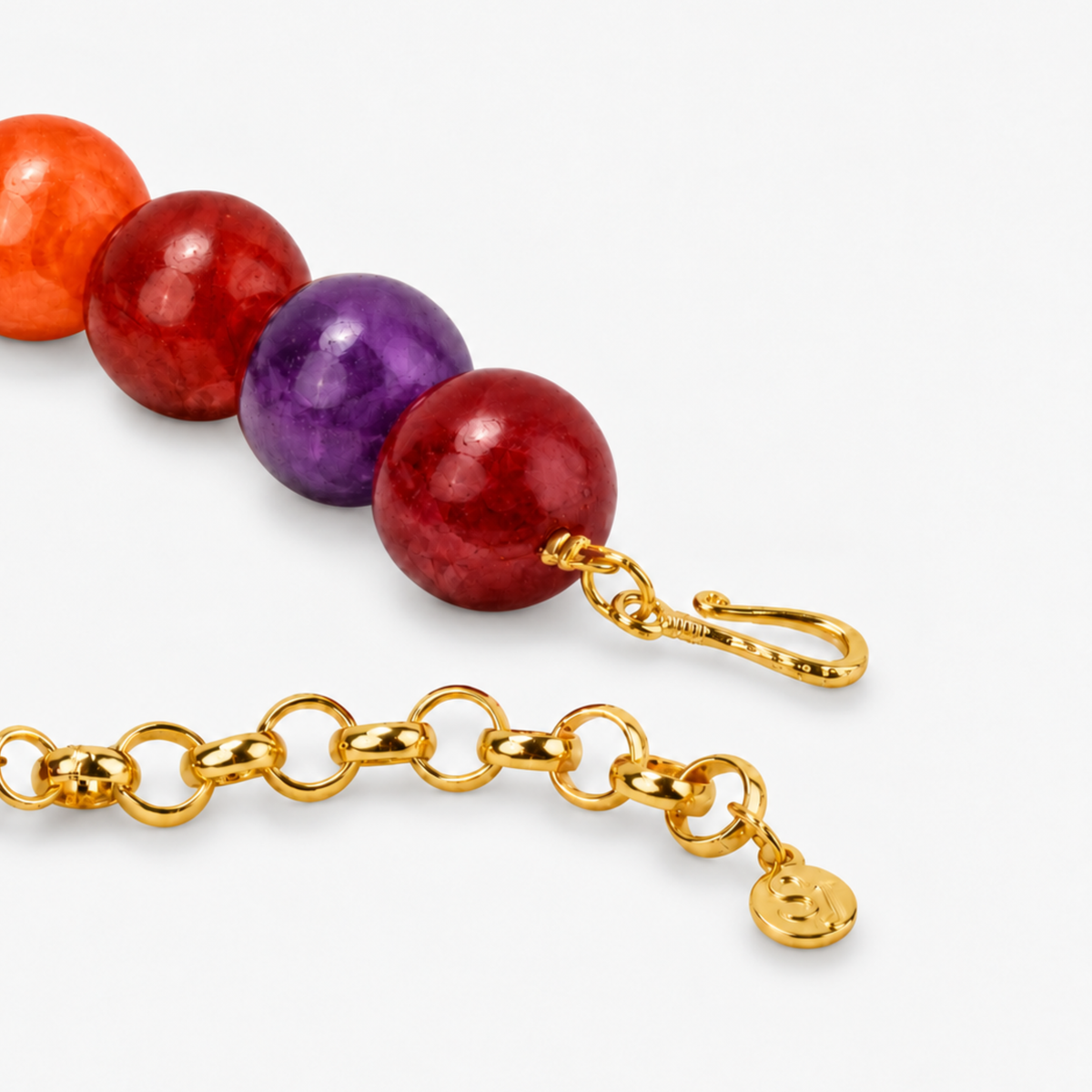 Close-up of Chrysallis Joyride statement necklace with colorful round beads and organic rainbow agate centerpiece.    
Rainbow statement jewelry featuring a raw sliced agate pendant and vibrant jewel toned beads.