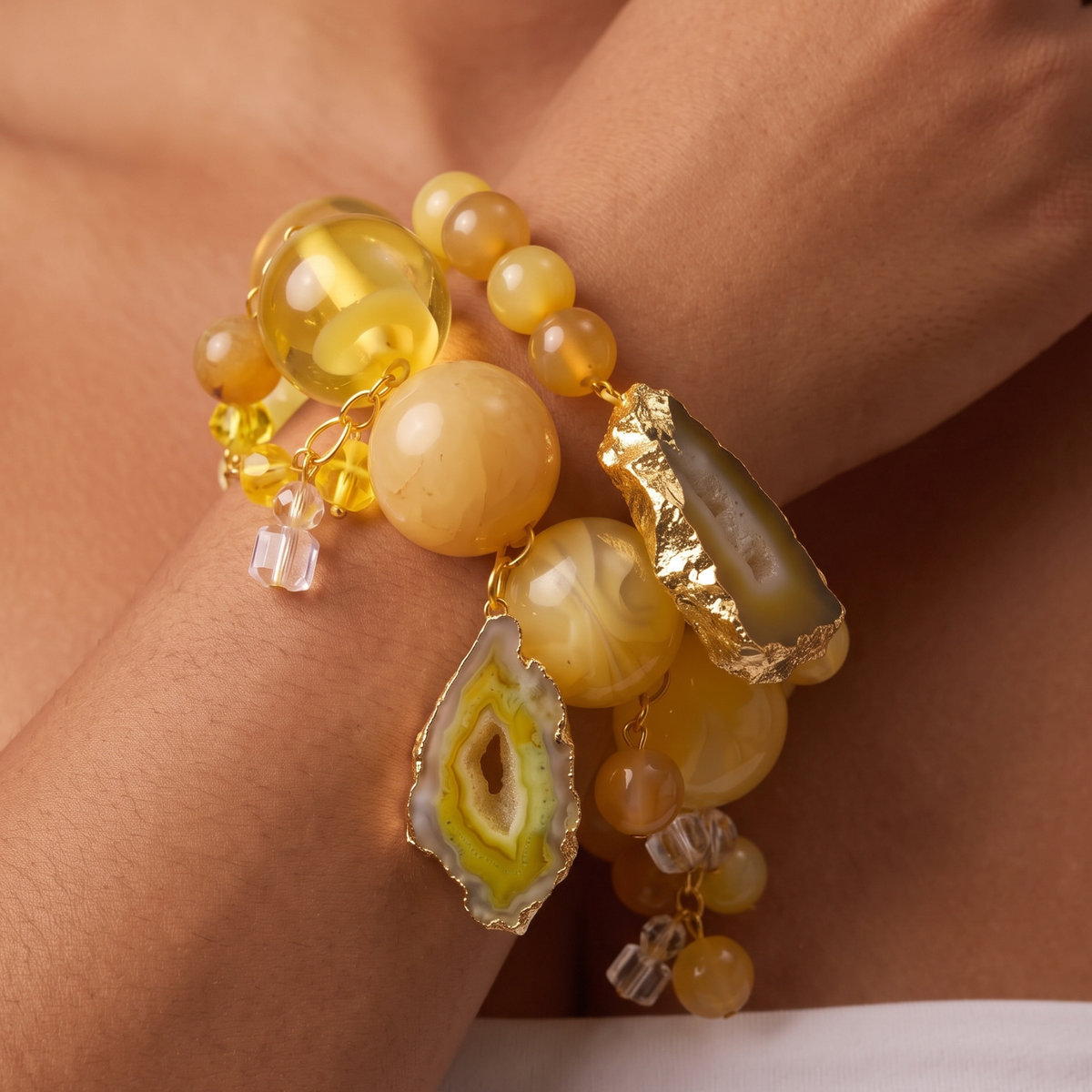 Two piece yellow stretch bracelet stack featuring a large natural agate centerpiece and coordinating beadwork.