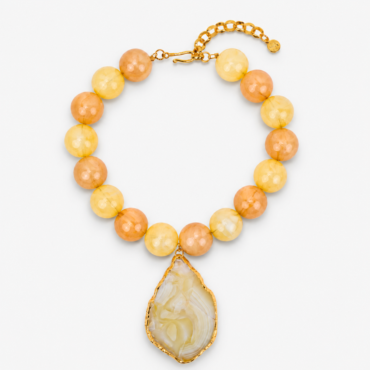 Chrysallis Necklace Lemon Sorbet featuring oversized yellow and peach marbled beads with a natural agate pendant.