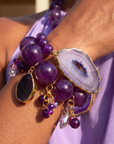 Three piece stretch bracelet stack featuring genuine purple agate beads, a natural druzy agate slice, crystal charms, gemstone accents, and gold detailing.