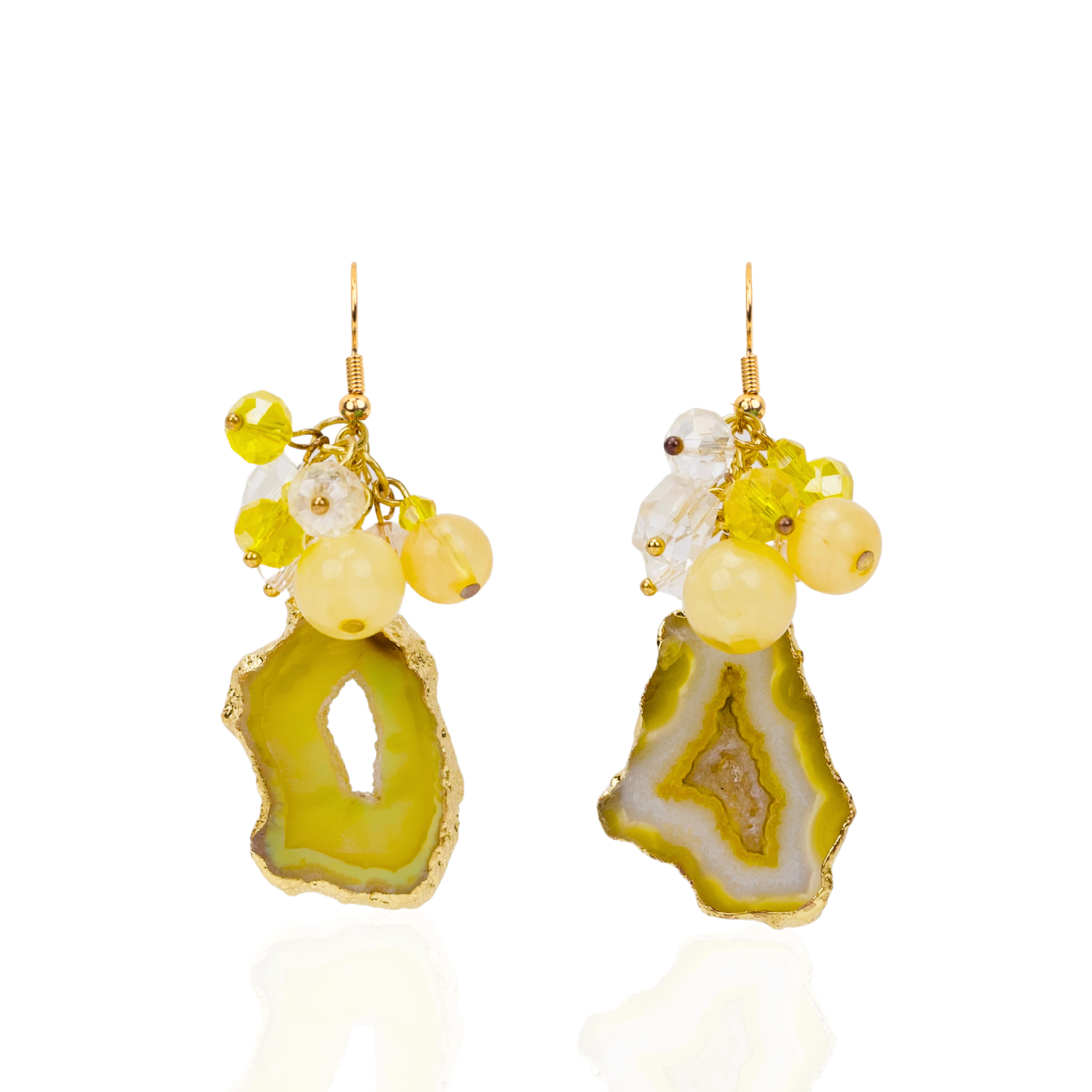 Yellow agate slice statement earrings featuring marbled lemon beads, faceted accents, gold trim, and dangling citrus-inspired details by Sassy Jones.
