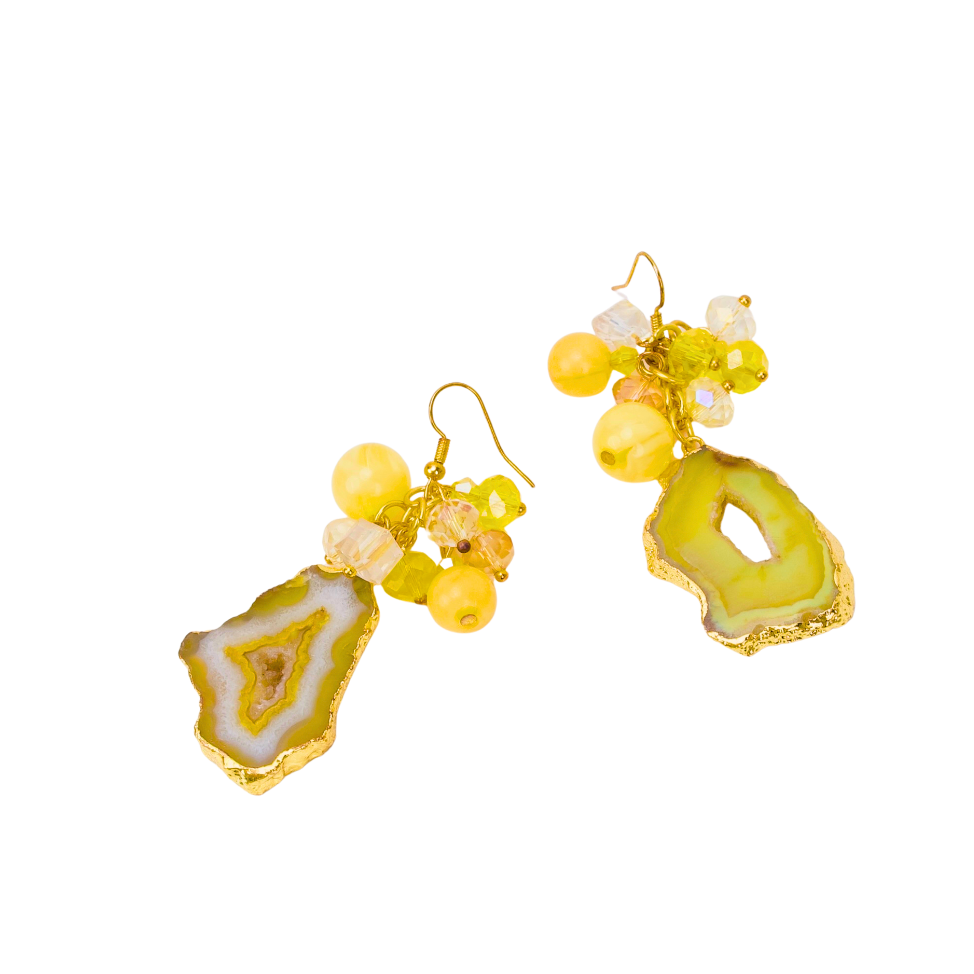 Yellow agate slice statement earrings featuring marbled lemon beads, faceted accents, gold trim, and dangling citrus-inspired details by Sassy Jones.