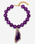 Chrysallis Purple Agate Druzy statement necklace featuring oversized polished agate beads and a one of a kind druzy agate centerpiece.
