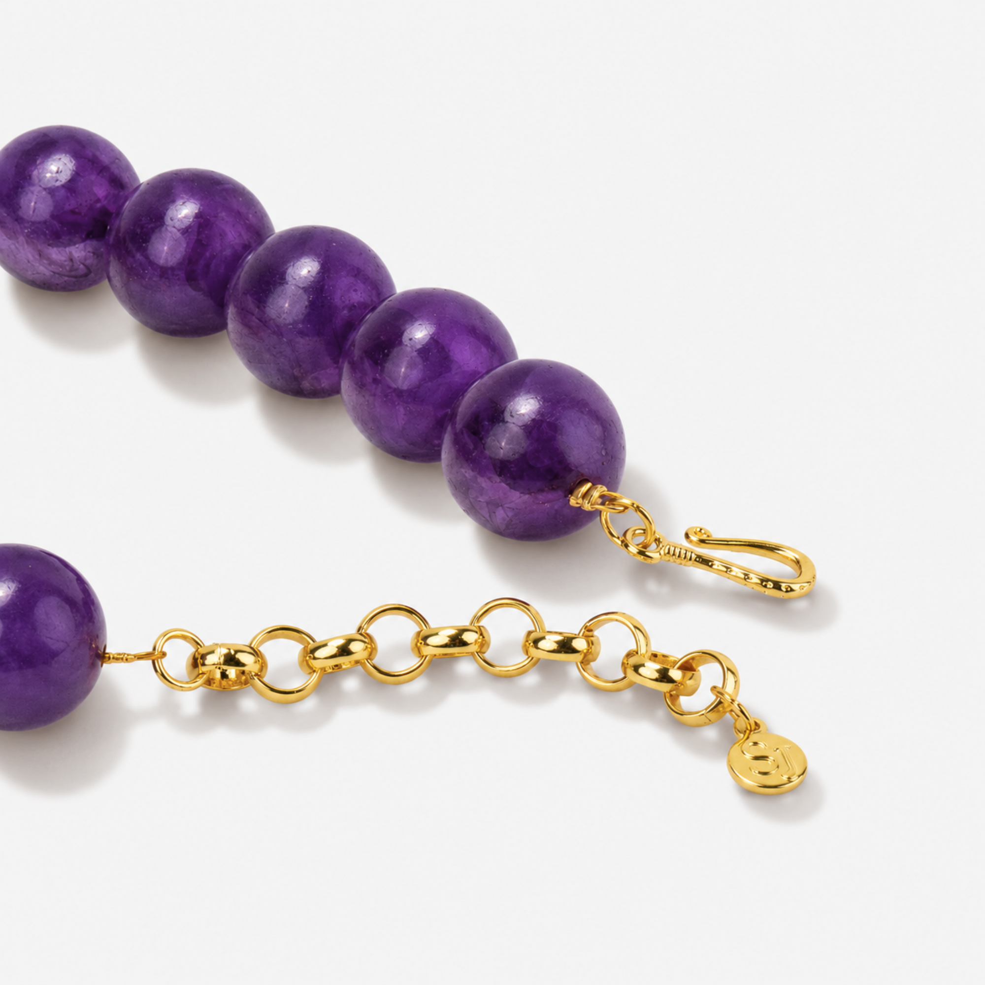 Chrysallis Purple Agate Druzy statement necklace featuring oversized polished agate beads and a one of a kind druzy agate centerpiece.