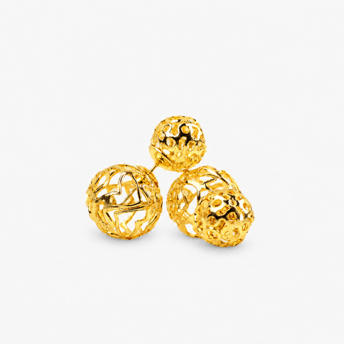 Dina Gold Openwork Sculptural Sphere Double Stud Earrings featuring two dimensional gold globes.