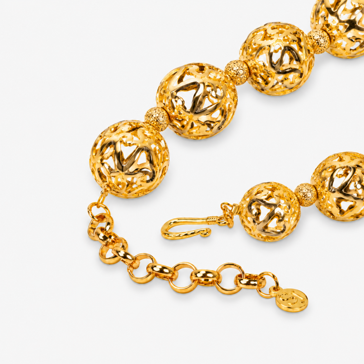 Dina Sculptural Globe Chain Gold featuring oversized openwork gold sphere beads.