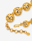 Dina Sculptural Globe Chain Gold featuring oversized openwork gold sphere beads.