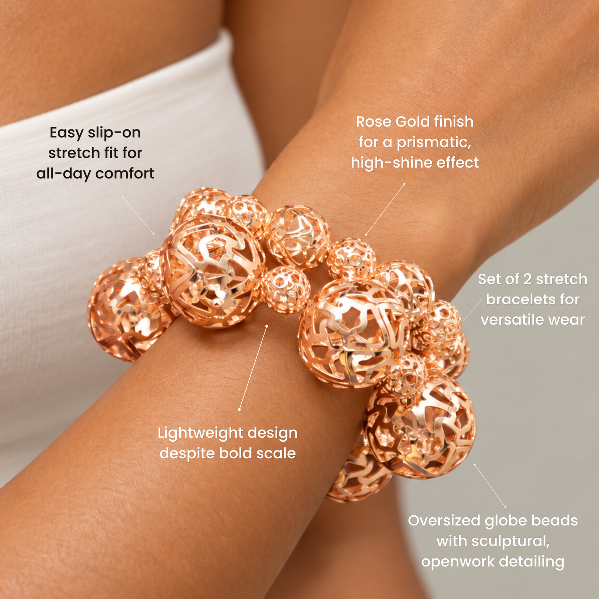 Rose gold bracelet duo featuring dimensional hollow globe beads in mixed sizes.