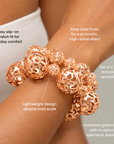 Rose gold bracelet duo featuring dimensional hollow globe beads in mixed sizes.