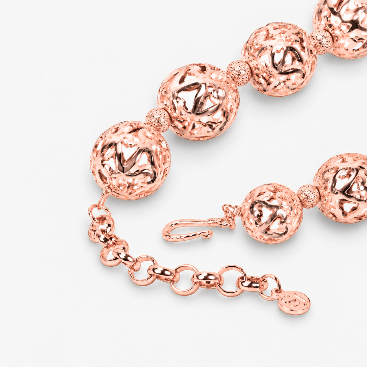 Dina Sculptural Globe Chain Rose Gold featuring oversized openwork sphere beads and smaller textured spacers.