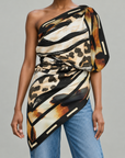 Sassy Jones Mary Butler Scarf showcasing abstract black brushstrokes over neutral leopard patterns.