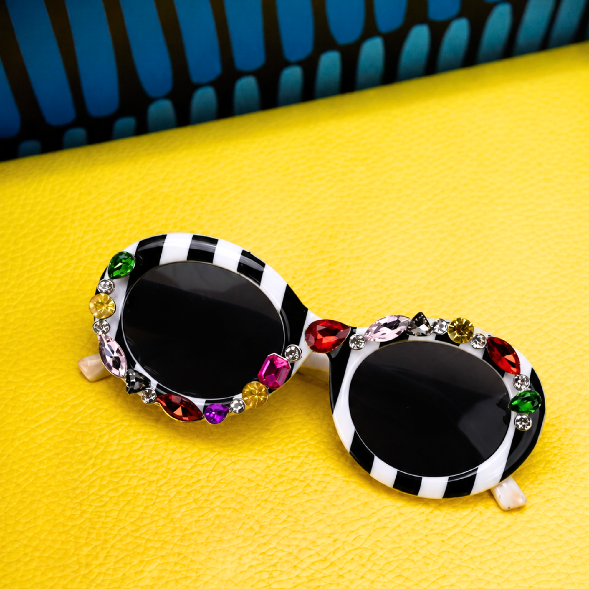 Sassy Chic accessory gift set with Genevieve Gem Stripe Sunglasses, Calypso Palm Crystal Adjustable Cuff and Untamed Luxe Scarf.