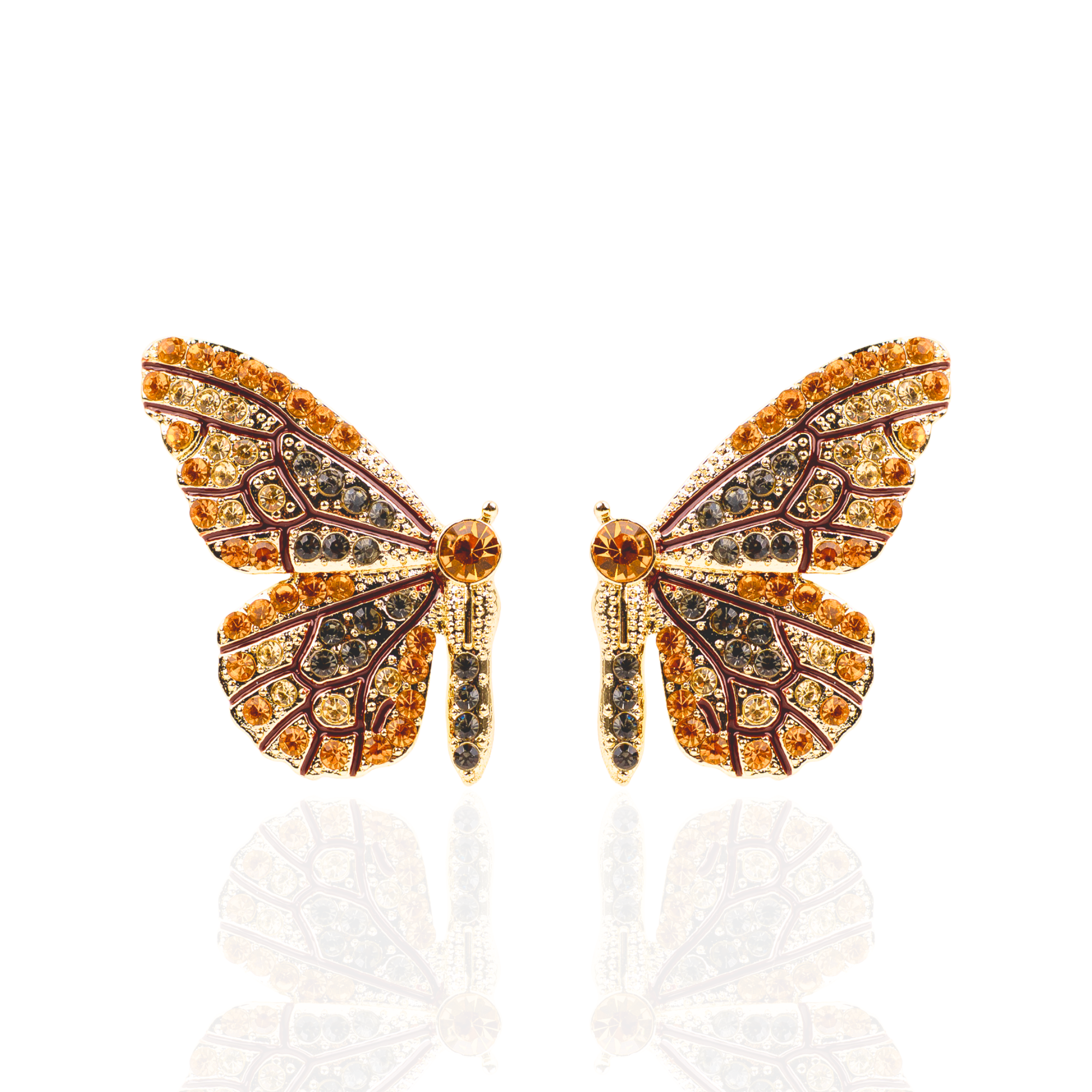 Gold butterfly stud earrings with champagne and smoky crystals in a delicate yet radiant design.