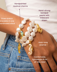 Three piece pearl stretch bracelet set with 18k gold plated nautical charms and colorful enamel details.