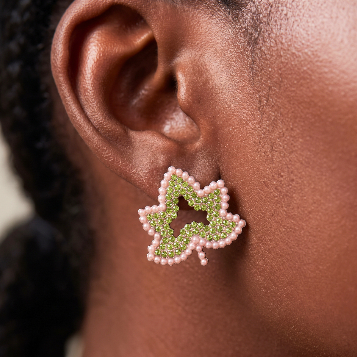 Ivey Dream Studs featuring green crystal ivy leaves outlined with petite pink pearls.