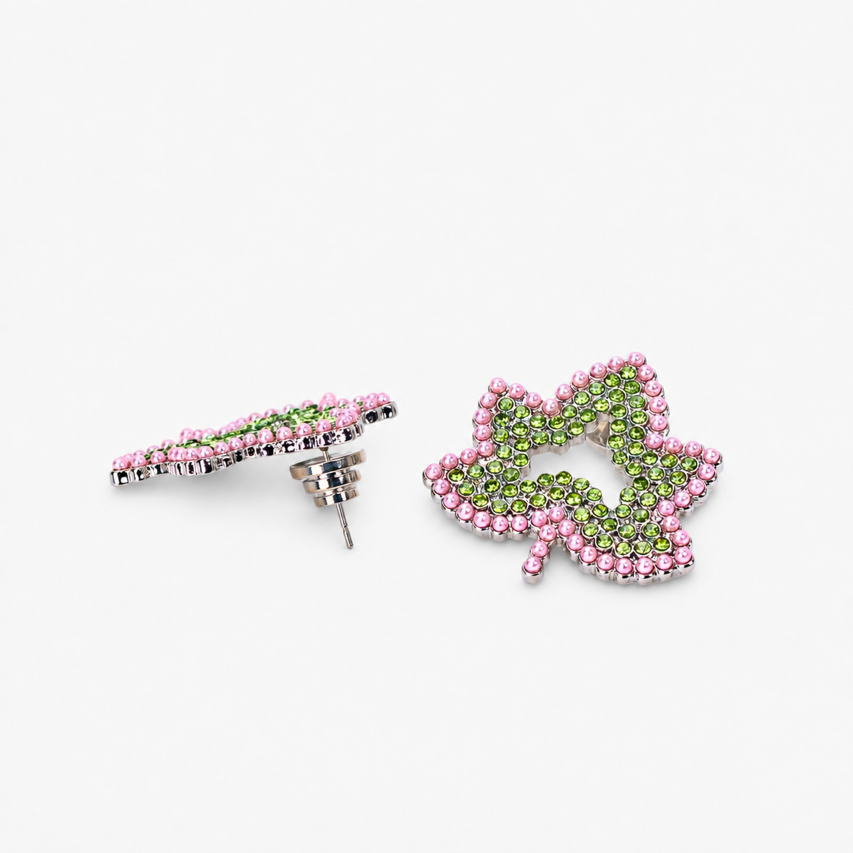 Ivey Dream Studs featuring green crystal ivy leaves outlined with petite pink pearls.