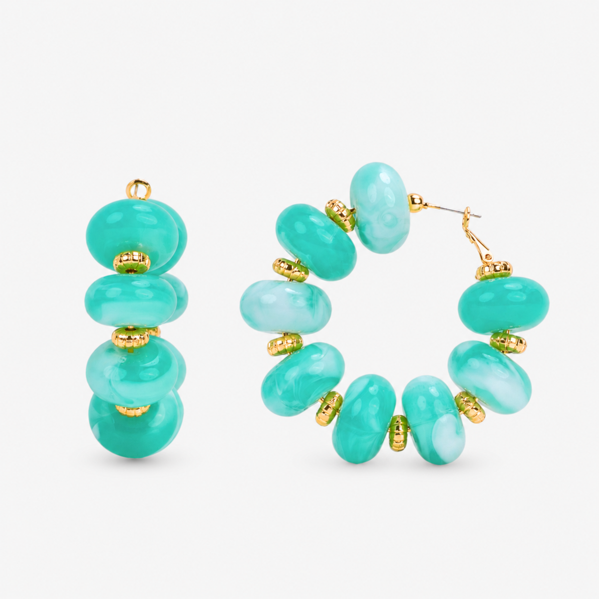 Kamaria Coconut Shell Statement Hoops in Riviera Teal featuring oversized marbled teal coconut shell pieces and gold accents.