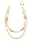 Layered ivory statement necklace featuring coconut-inspired beads, faceted clear stones, brushed gold accents, and neutral coastal styling by Sassy Jones.