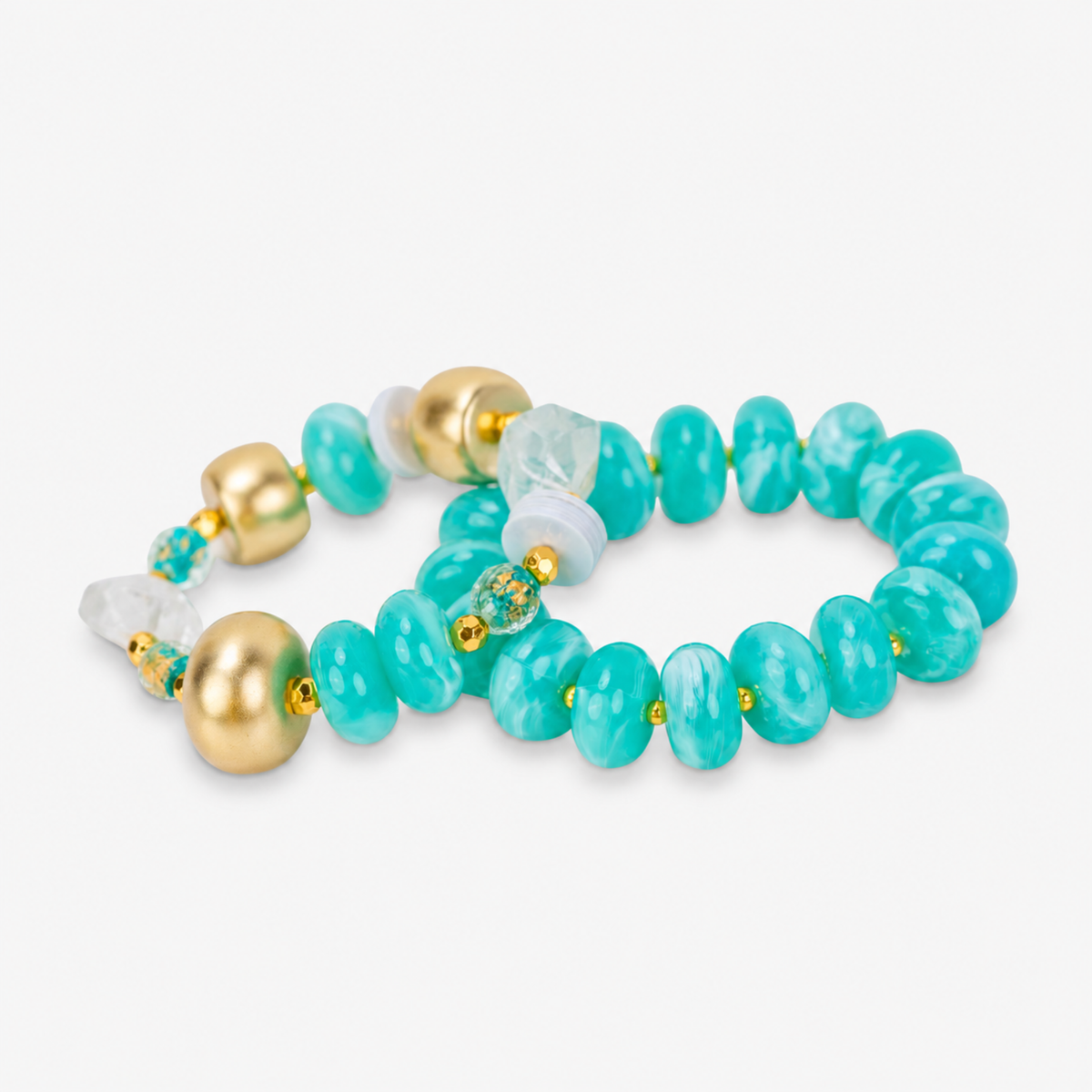 Kamaria Coconut Shell Statement Bracelet Stack in Riviera Teal featuring oversized marbled teal coconut shell pieces and gold accents.