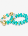 Kamaria Coconut Shell Statement Bracelet Stack in Riviera Teal featuring oversized marbled teal coconut shell pieces and gold accents.