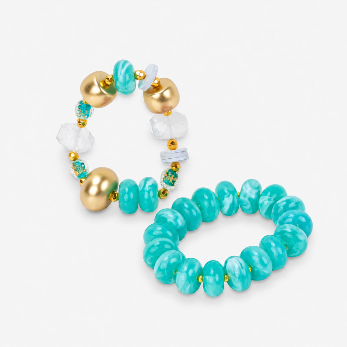 Kamaria Coconut Shell Statement Bracelet Stack in Riviera Teal featuring oversized marbled teal coconut shell pieces and gold accents.