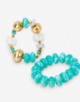 Kamaria Coconut Shell Statement Bracelet Stack in Riviera Teal featuring oversized marbled teal coconut shell pieces and gold accents.