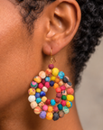 Kenza statement earrings featuring mixed solid and patterned textile beads in sculptural round drops.