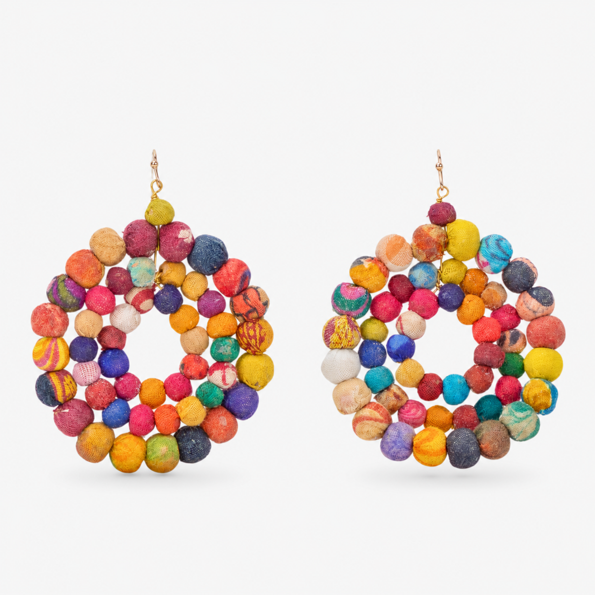 Kenza Cloth Bead Dangle Earrings in multicolor featuring layered circular rows of vibrant fabric wrapped beads.