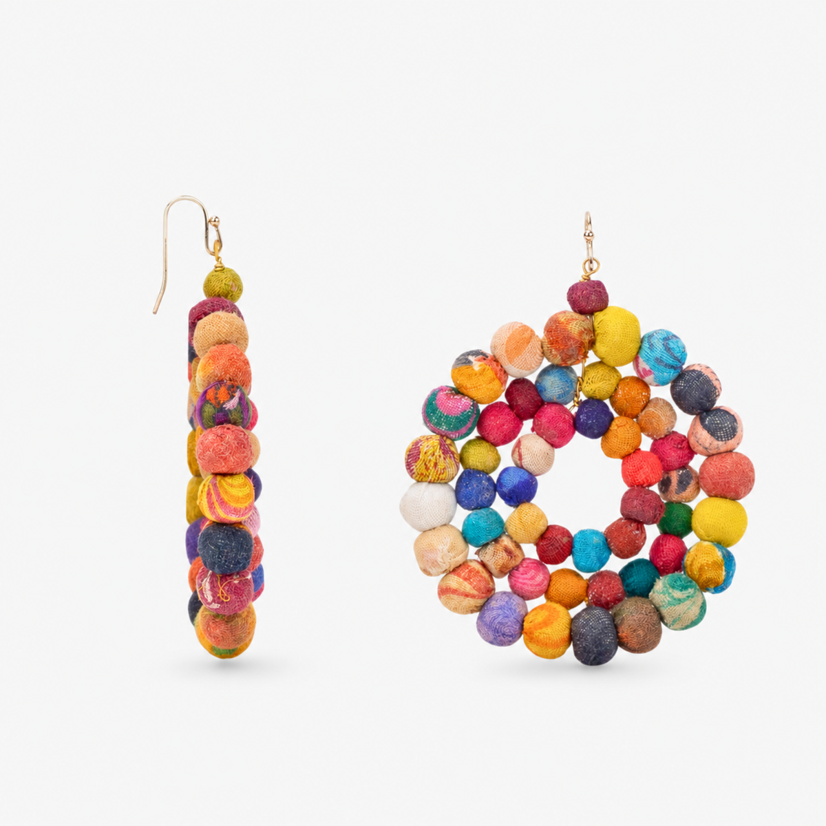 1. Close view of multicolor cloth bead dangle earrings featuring layered beads in bright mixed colors and patterns.