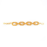Kerri Gold Bracelet - Sassy Jones | -Interlocking chain links -Inlaid with golden Colorado topaz crystals -Matte gold metal hardware -2-inch extender and easy hook closure