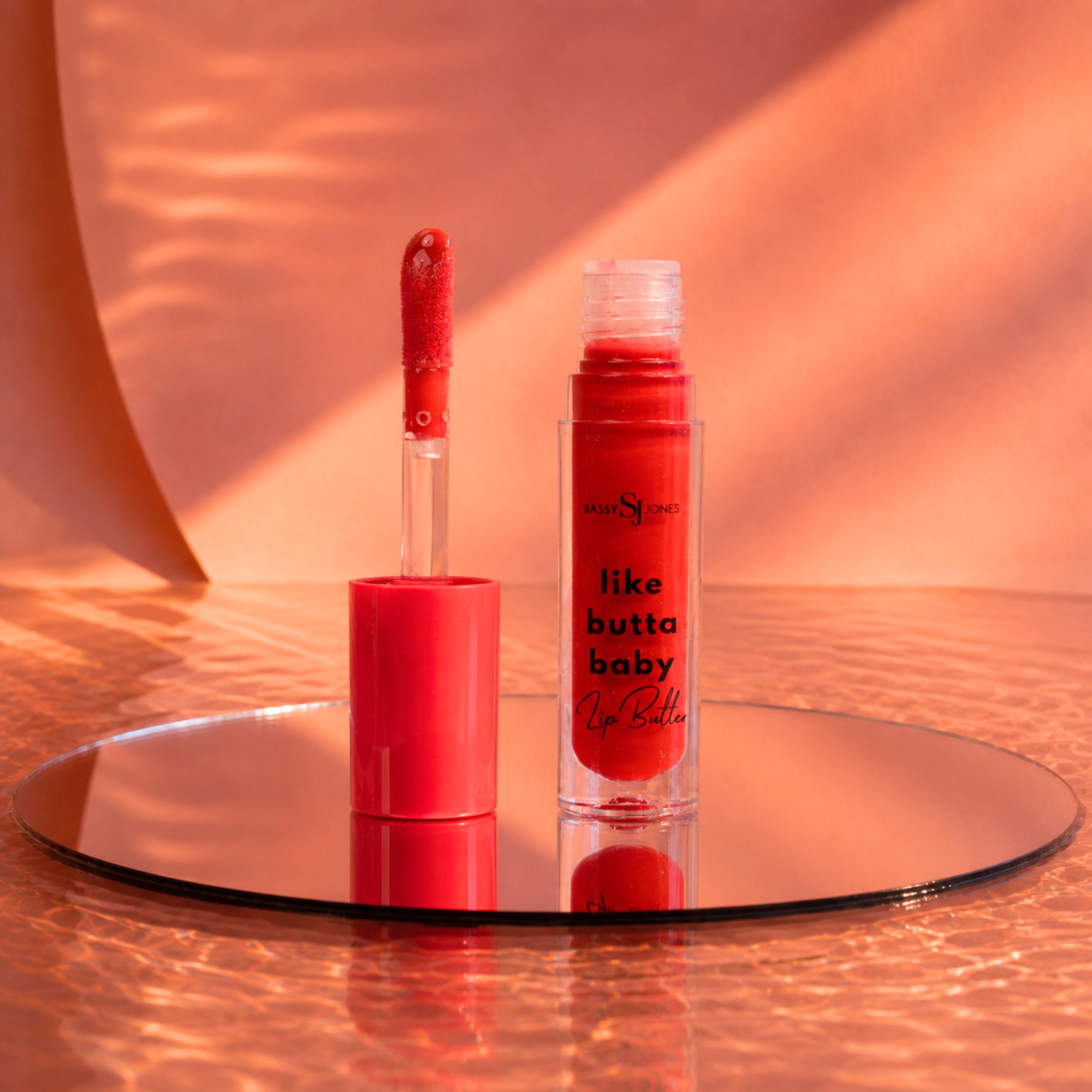 You Tried It Lip Butter gloss in bold vibrant red with high shine glossy finish and smooth creamy texture