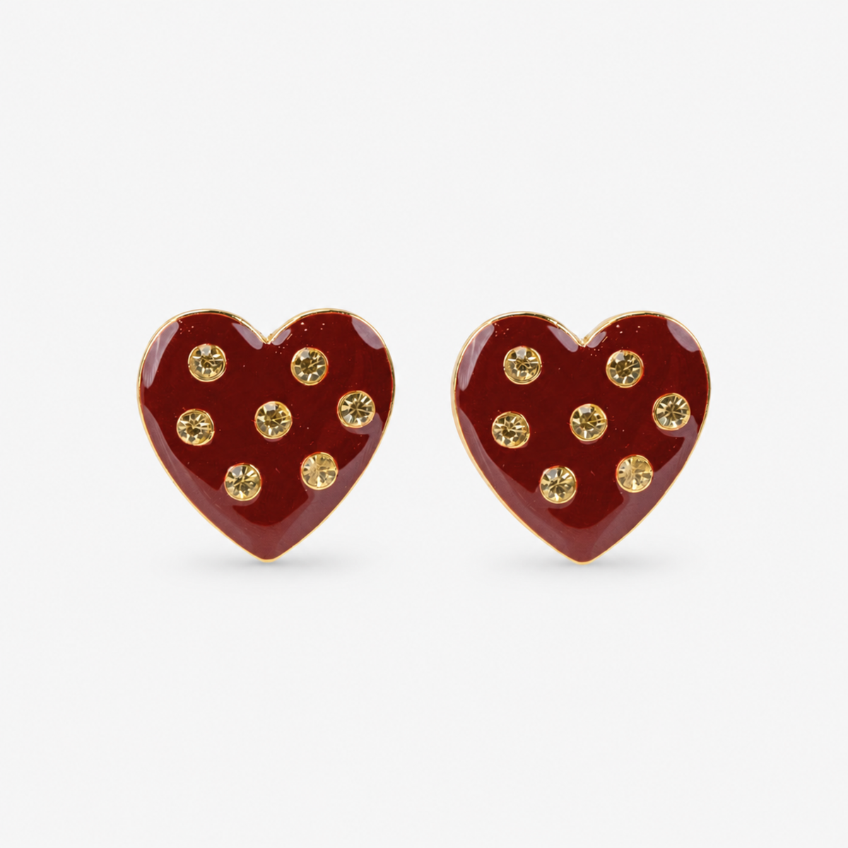 Lovebug 18K Studs in Crimson featuring oversized glossy red hearts with seven clear crystal accents and gold trim.