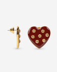 Close up of Lovebug 18K Stud showing a glossy crimson heart embellished with seven sparkling clear crystals.     Sassy Jones Lovebug heart earrings featuring rich red heart silhouettes, crystal embellishments and polished gold edging.
Oversized red heart stud earrings featuring a glossy crimson surface with clear crystals and 18K gold plated detailing.