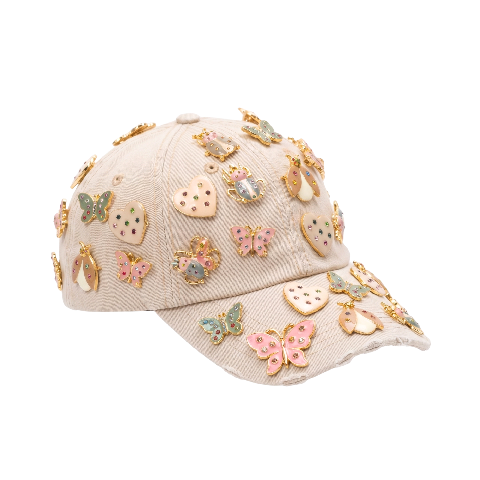 Tan distressed denim ballcap featuring removable butterfly, ladybug, heart, and floral crystal brooch pins by Sassy Jones.