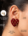 On model view of Lovebug Crimson Heart Stud Earring featuring a deep red finish with sparkling crystal details.