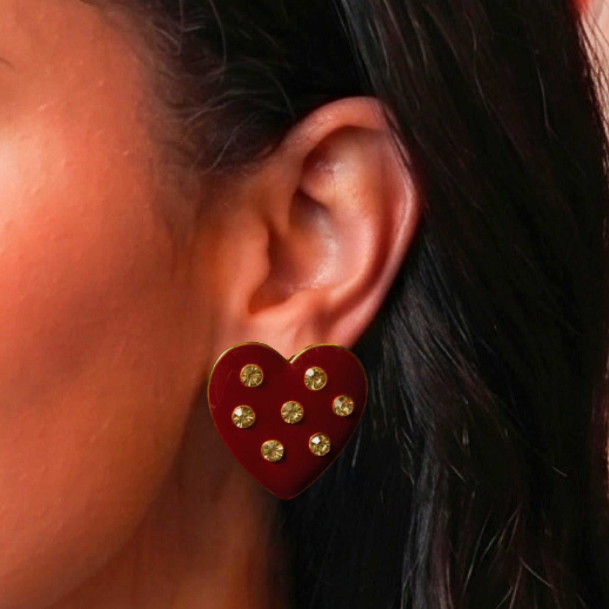 Crimson heart-shaped stud earrings with crystal accents and 18K gold-plated trim from the Lovebug collection