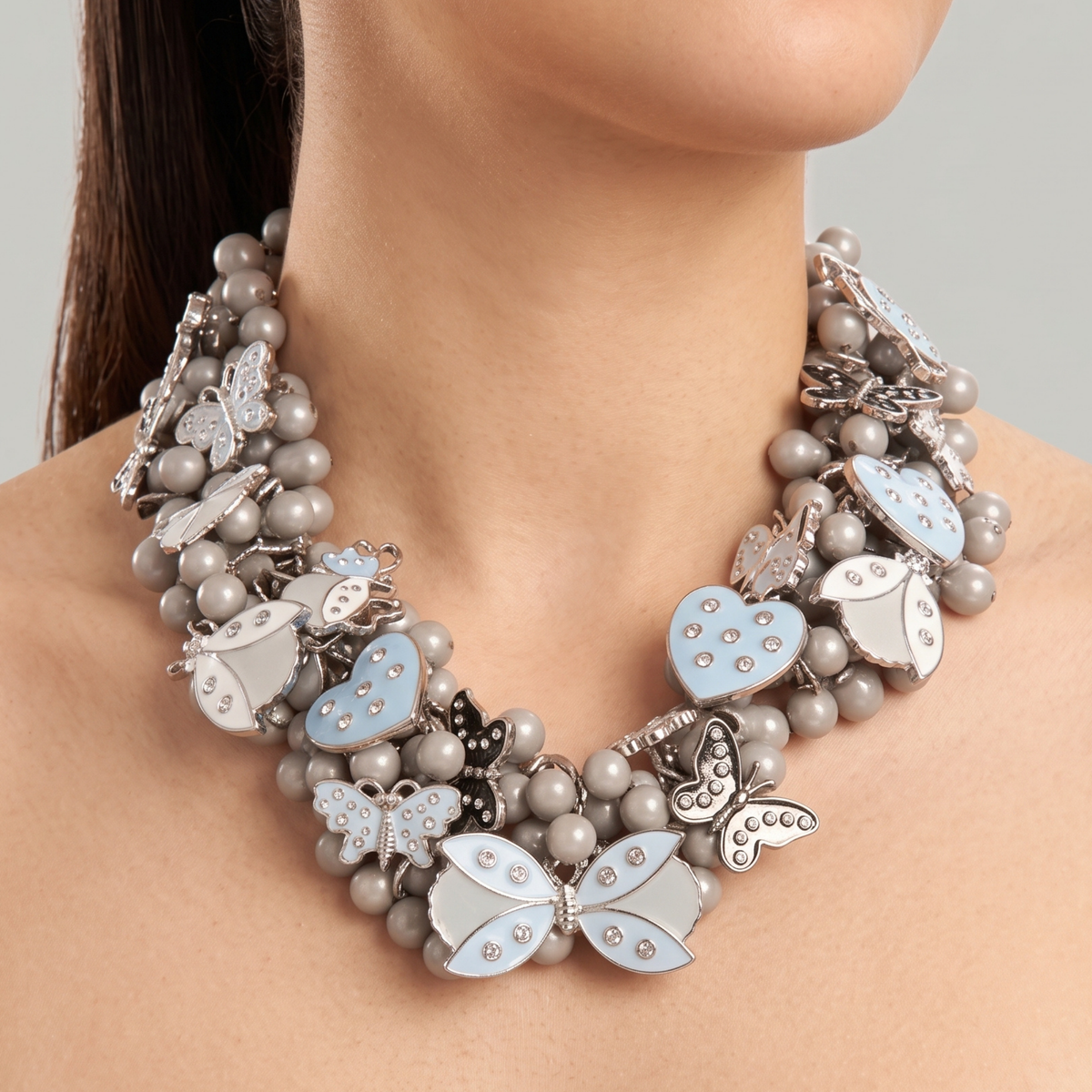 Lovebug Greige Jewelry Unique Beaded Necklace Grey Statement Necklace Heart Shaped Earrings Fashionable Greige Jewelry Designer Lovebug Necklace Trendy Grey Accessories Artistic Statement Jewelry Beaded Lovebug Jewelry Set Elegant Grey Fashion Jewelry High Fashion Beaded Necklace