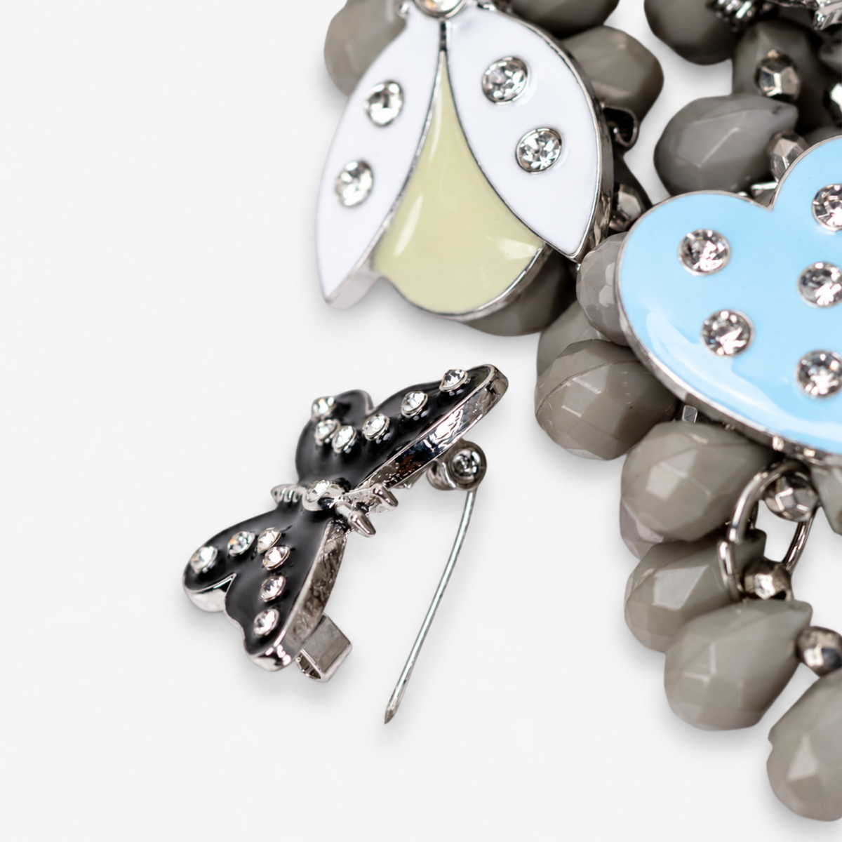 Lovebug Greige Jewelry Unique Beaded Necklace Grey Statement Necklace Heart Shaped Earrings Fashionable Greige Jewelry Designer Lovebug Necklace Trendy Grey Accessories Artistic Statement Jewelry Beaded Lovebug Jewelry Set Elegant Grey Fashion Jewelry High Fashion Beaded Necklace