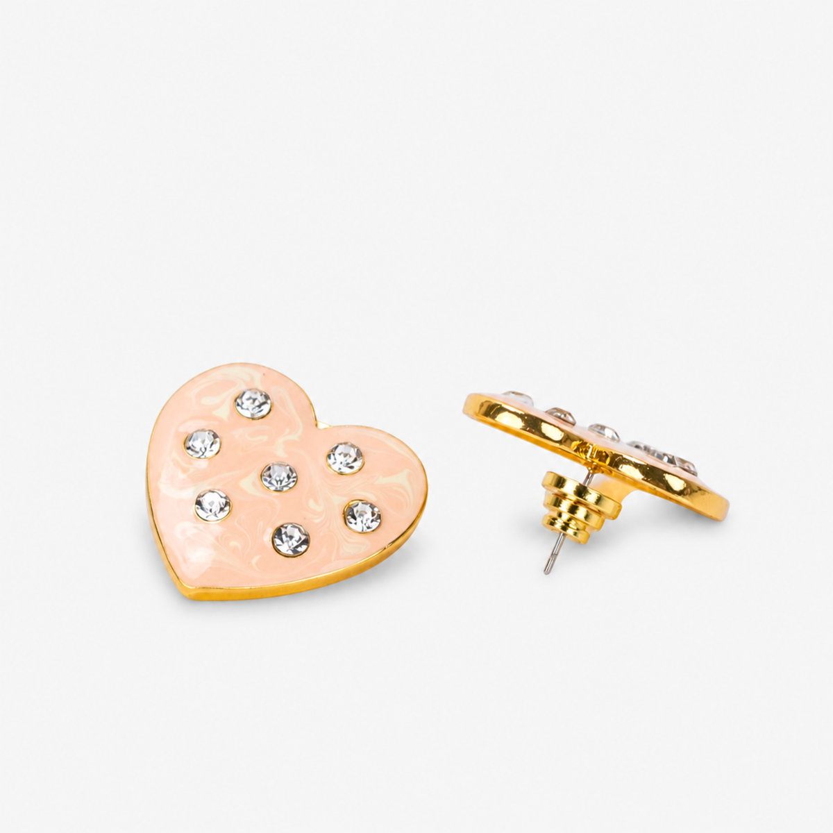 On model view of Lovebug Cream Heart Stud Earring featuring a glossy marbled finish and scattered crystals.