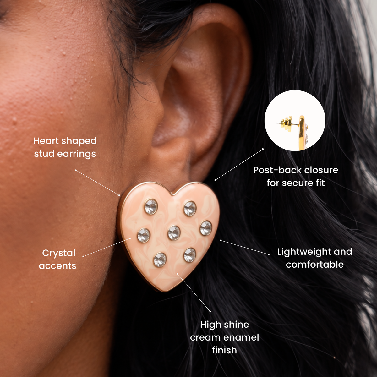 Cream heart statement earrings featuring soft swirled detailing, clear round crystals and an 18K gold plated border.