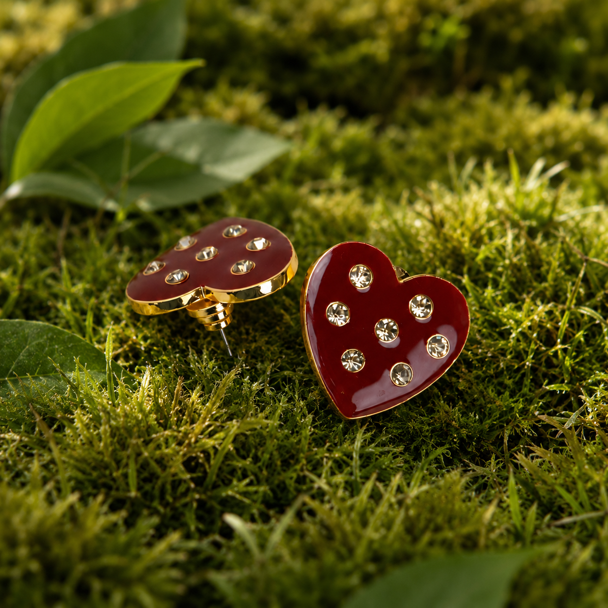 Crimson heart-shaped stud earrings with crystal accents and 18K gold-plated trim from the Lovebug collection