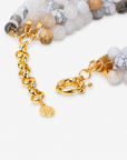 Close view of Ivory Estate Botswana agate necklace showcasing marbled, translucent and naturally varied round stone beads.