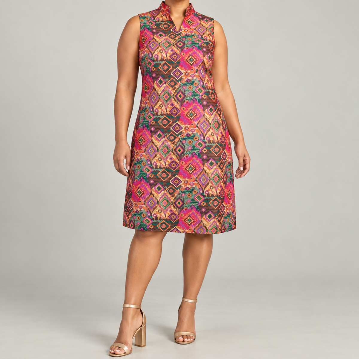 Margaux Jacquard Shift Dress featuring a vibrant multicolor geometric print and sleeveless knee length silhouette.