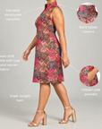 Multicolor jacquard shift dress featuring a structured sleeveless silhouette, collared neckline and pockets.